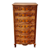 Seven-drawer chest of drawers with Louis XV style engraving.