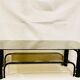 Black and gold coffee table with double tops in smoked glass circa 1970