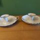 Pair of enamelled candle holders