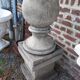 Ball on base in gray patinated reconstituted stone