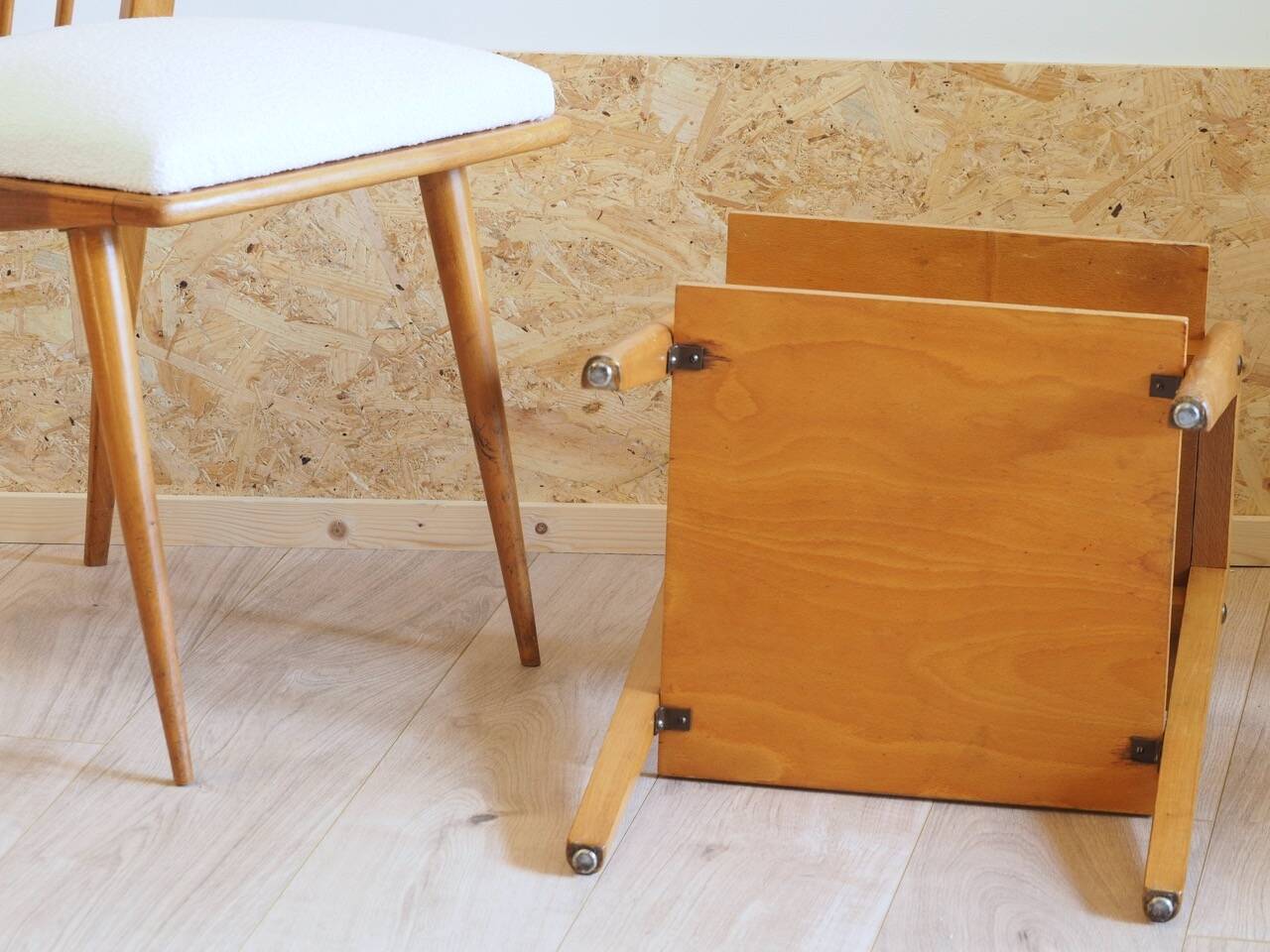 Bedside or side table with compass legs.