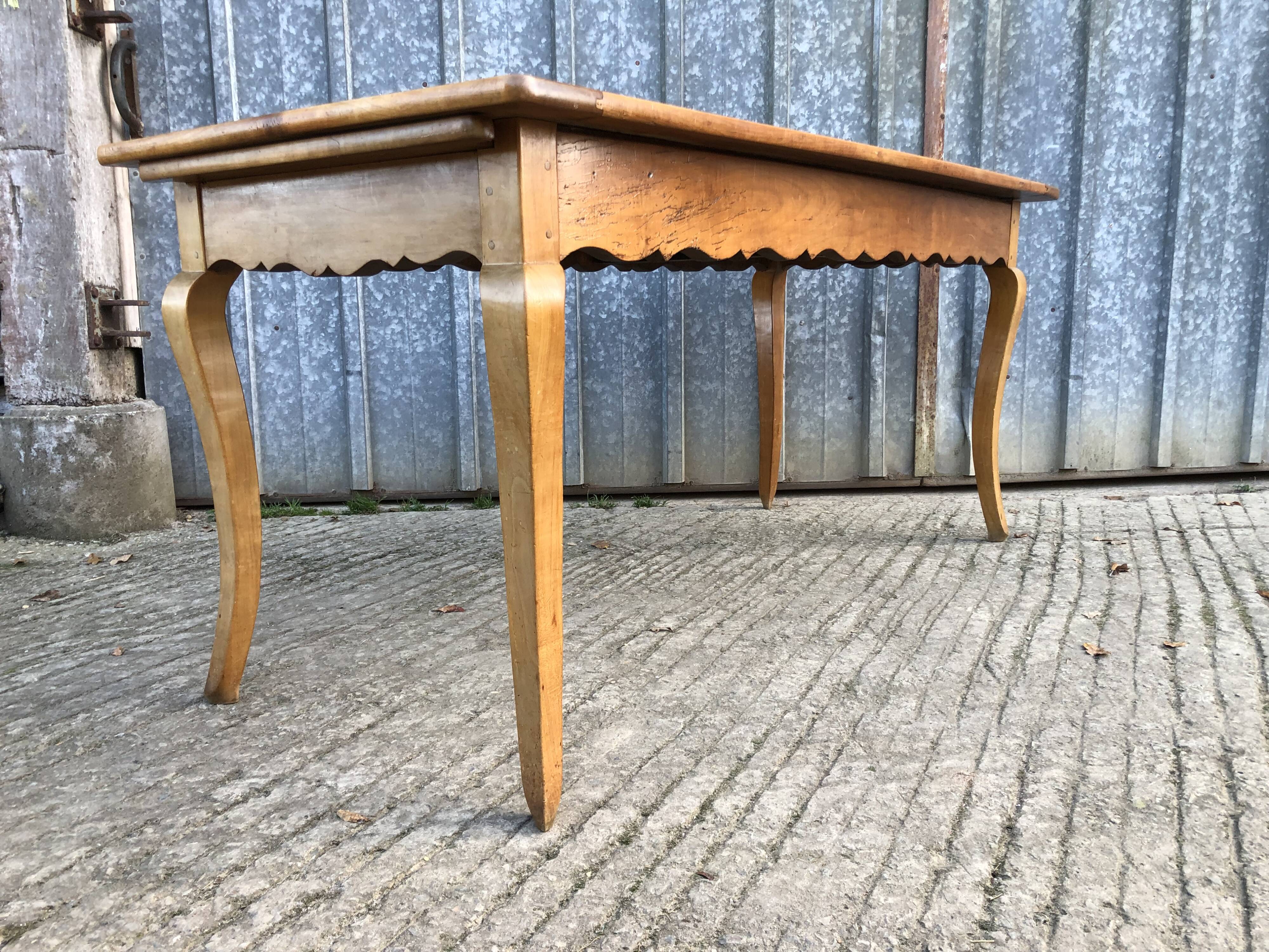 Antique Louis XV style farmhouse table in solid cherry wood.
