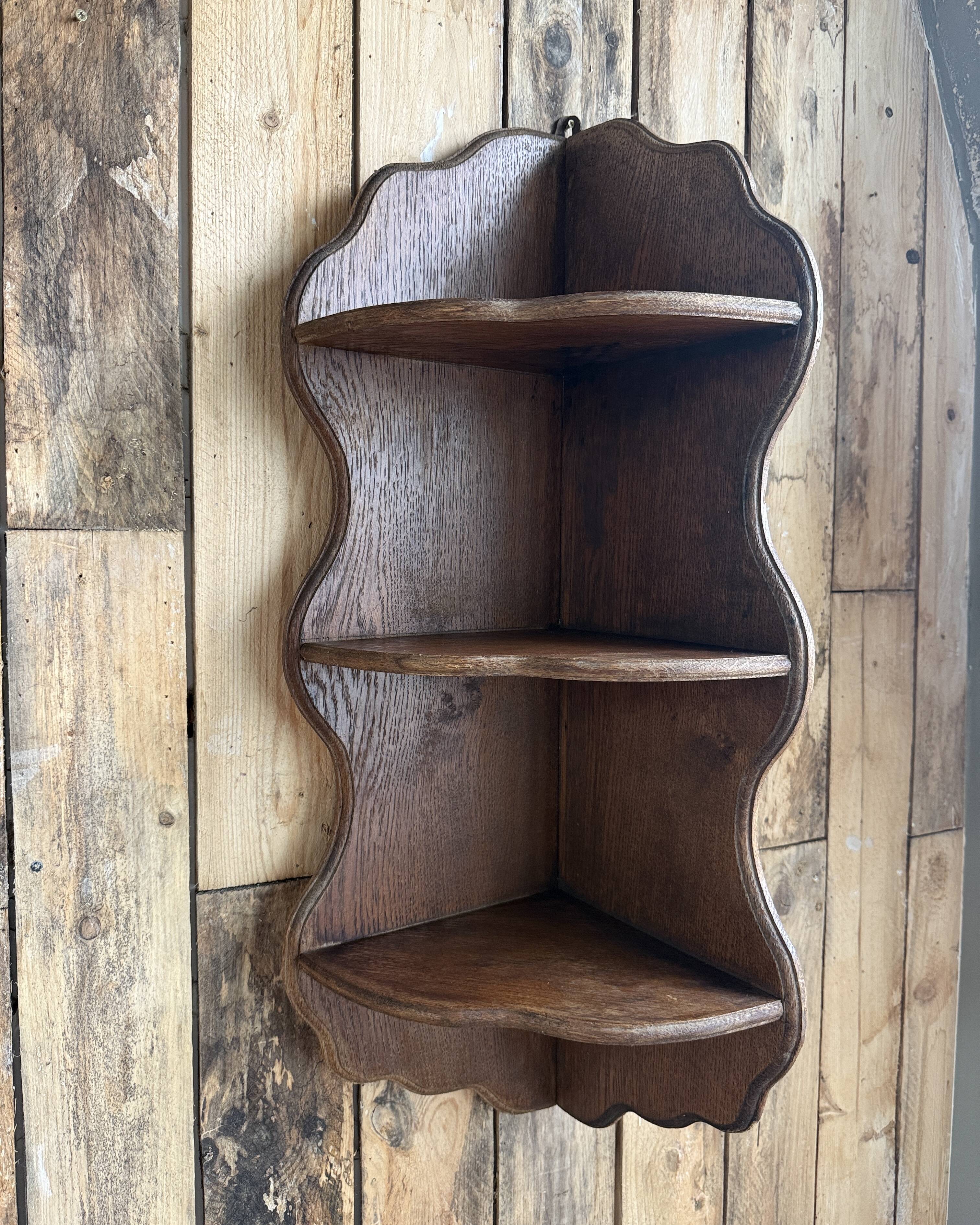 Old corner shelf in solid oak