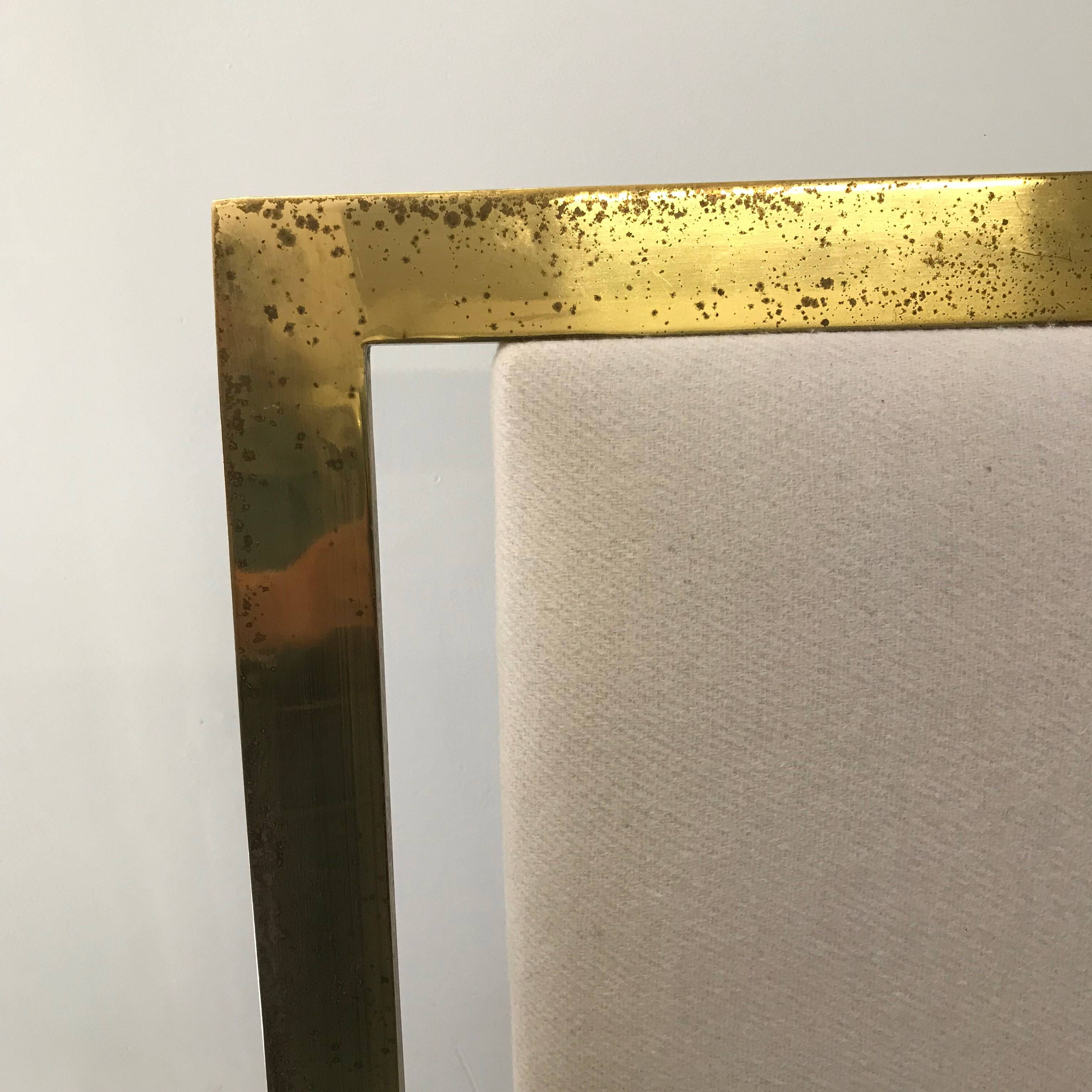 Set of 2 Michel Mangematin chairs in brass and virgin wool.