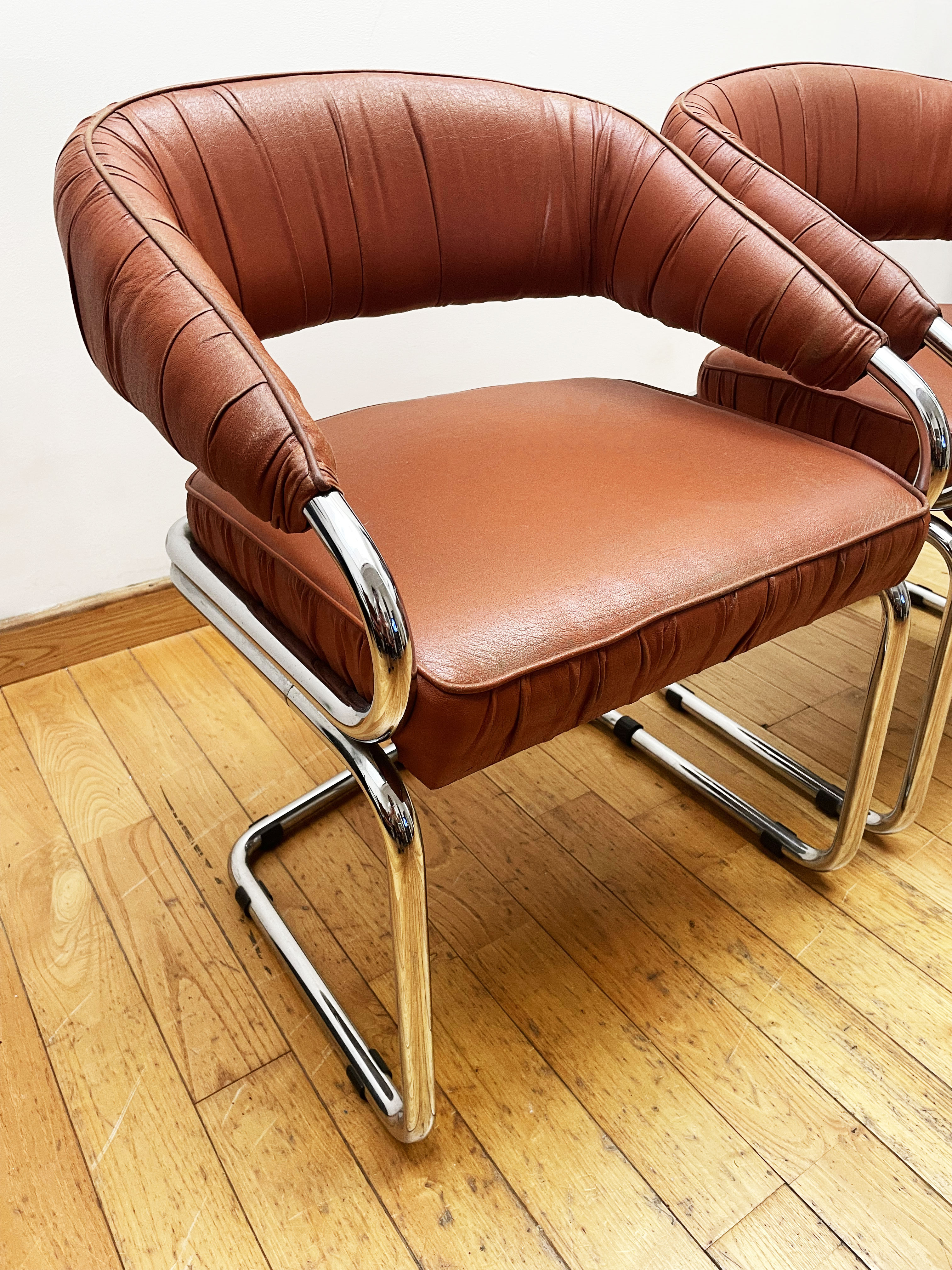 Pair of leather armchairs year 70