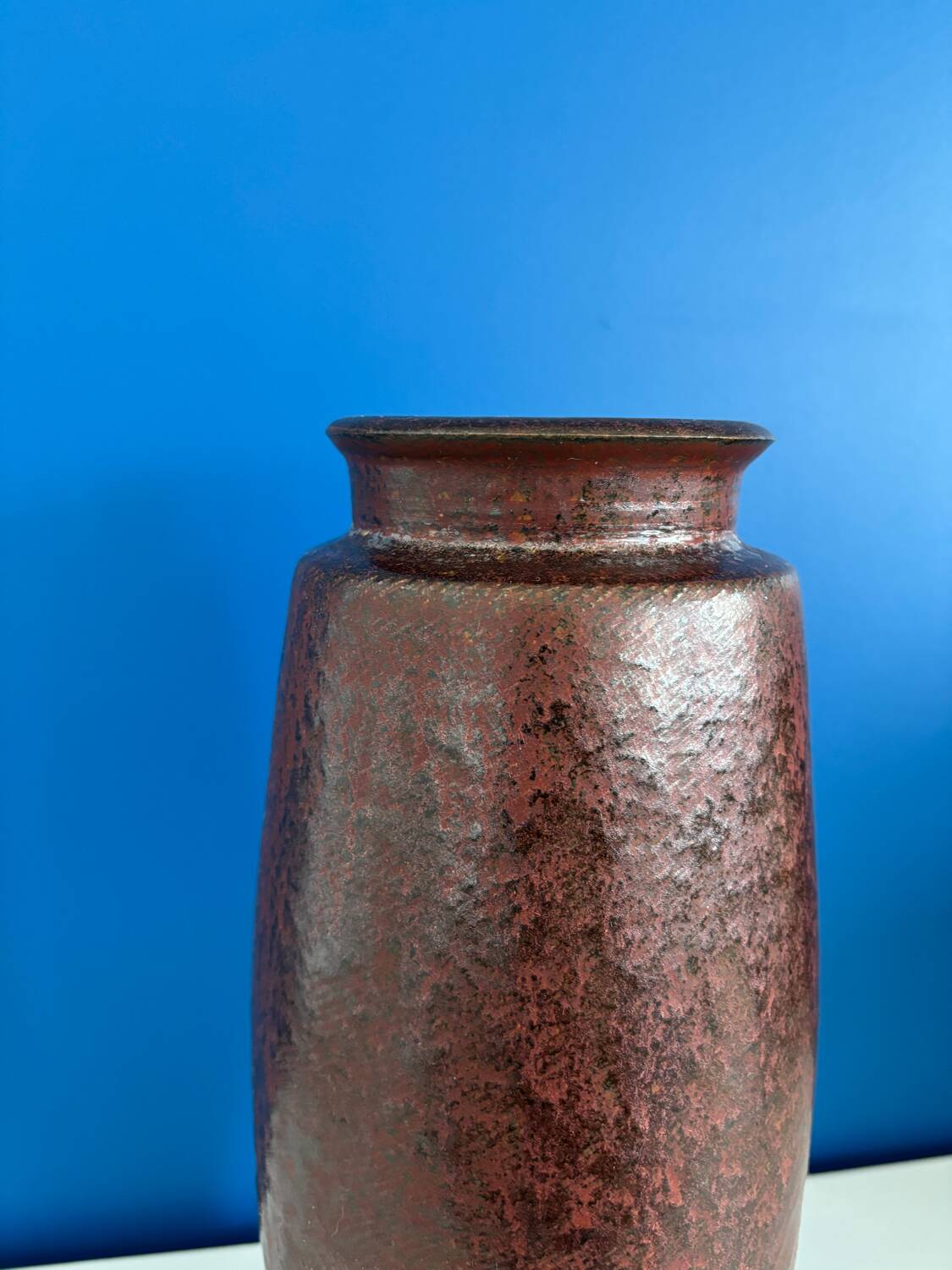 Large textured dark ceramic vase