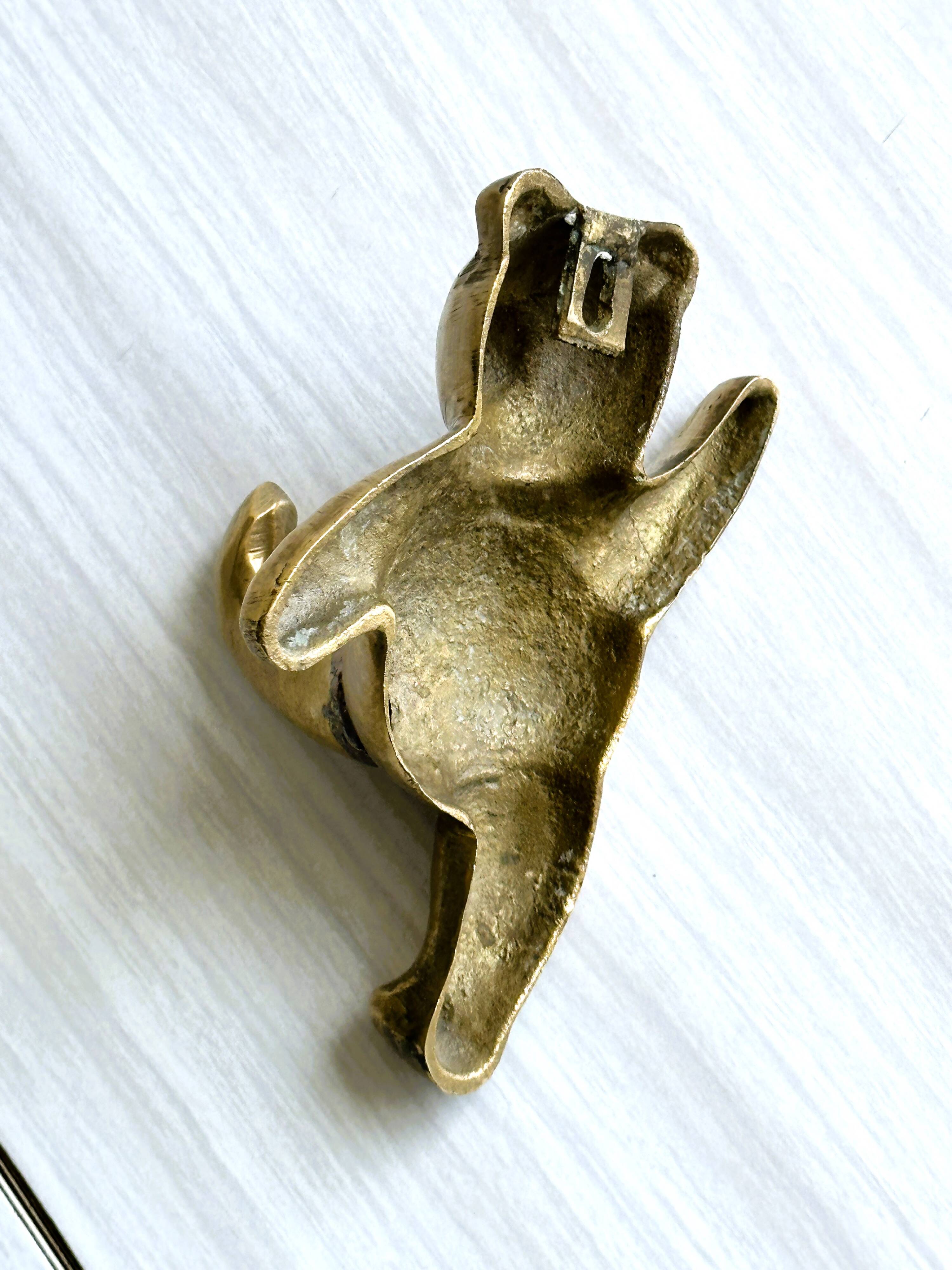 Towel rack - metal bear coat rack.