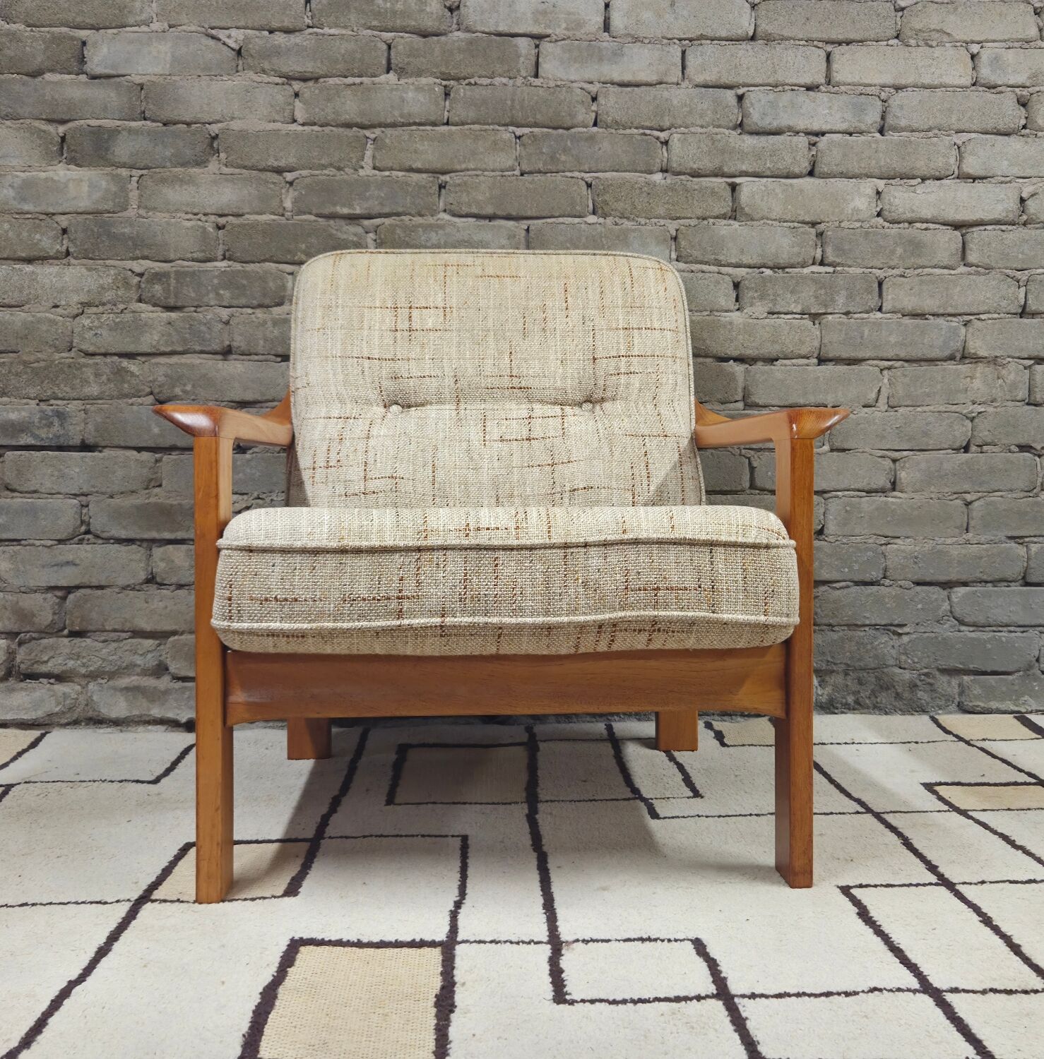 Danish canapé and its 1970s teak armchair