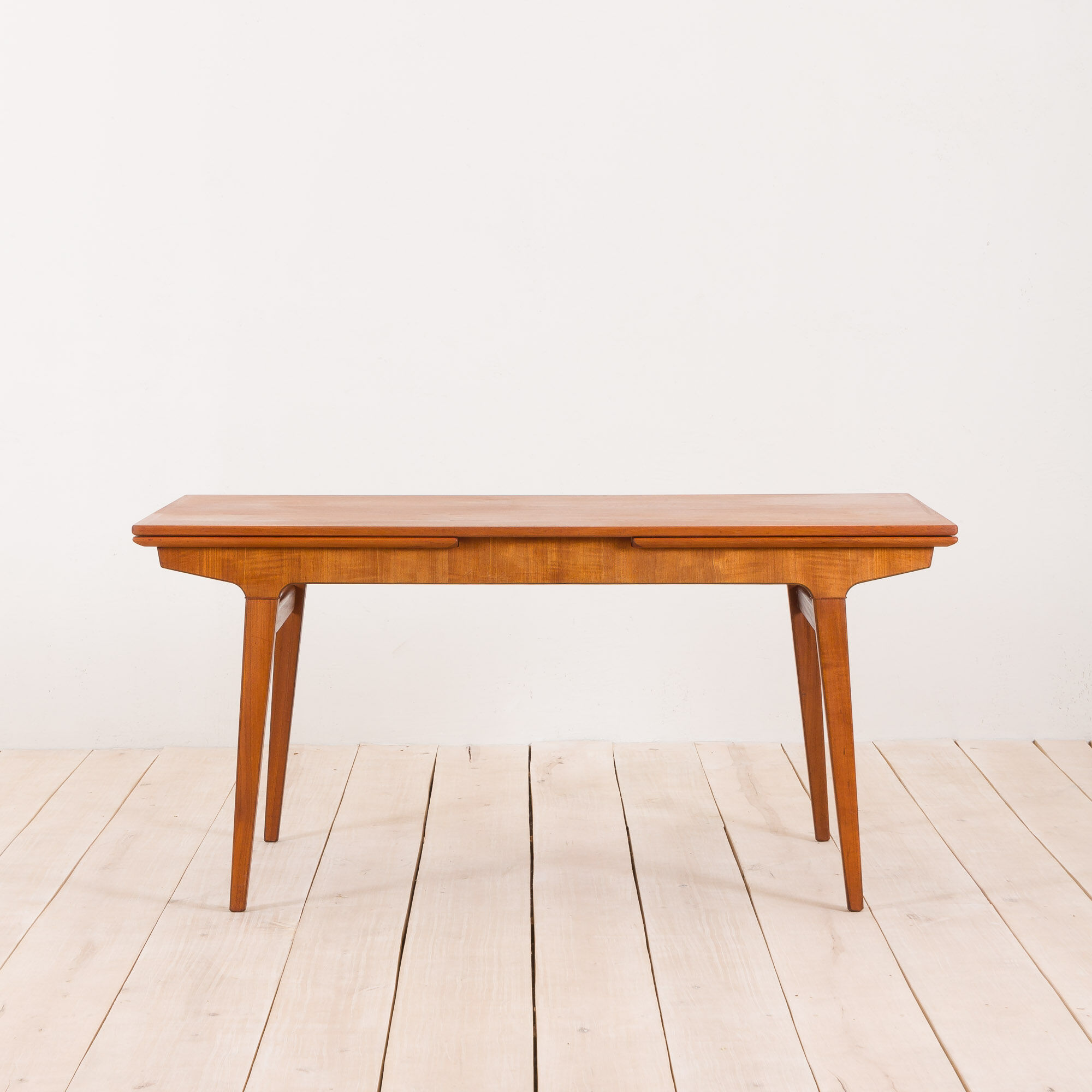 Teak extension dining table with concealed panels, Denmark, 60s