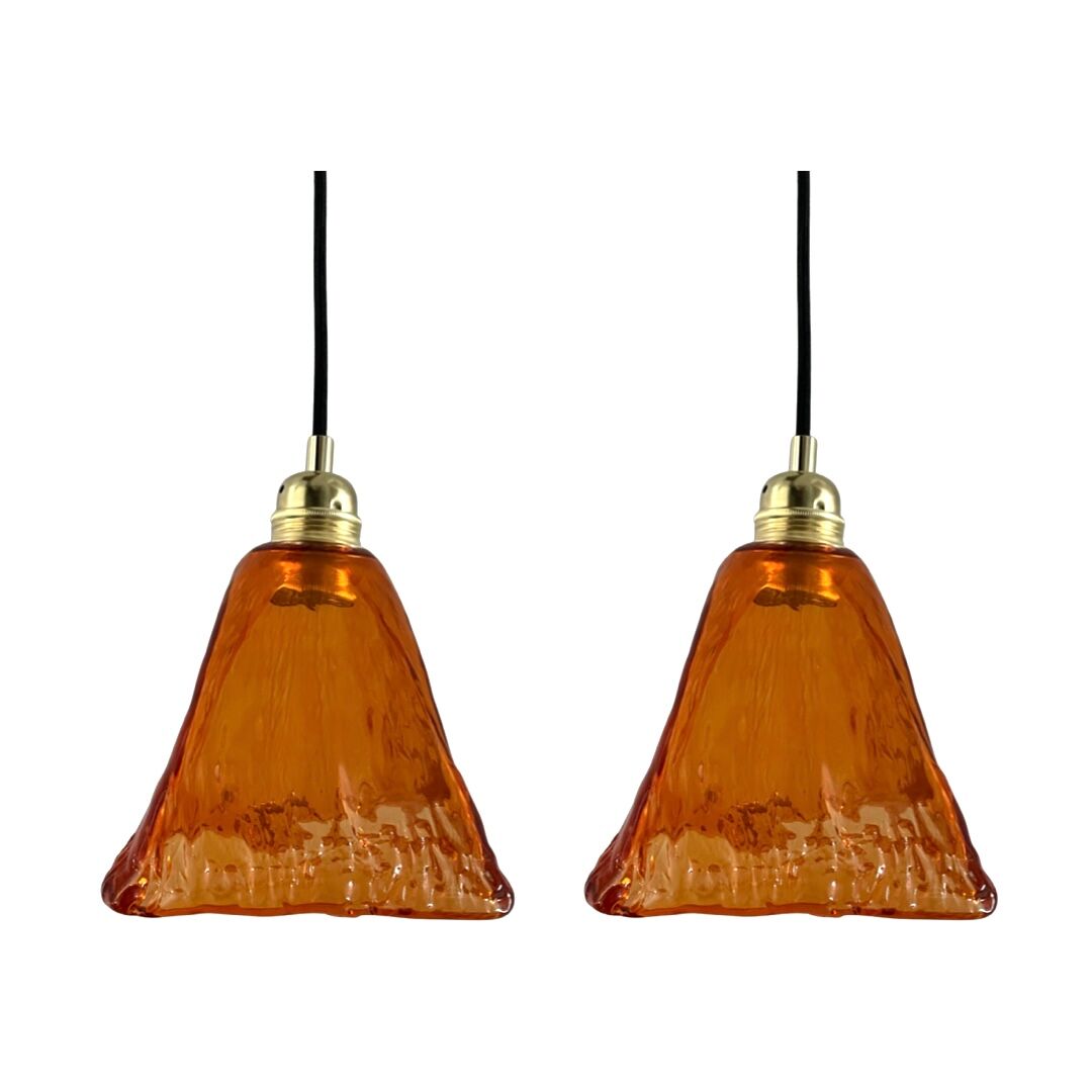 Set of two amber glass hanging lamps