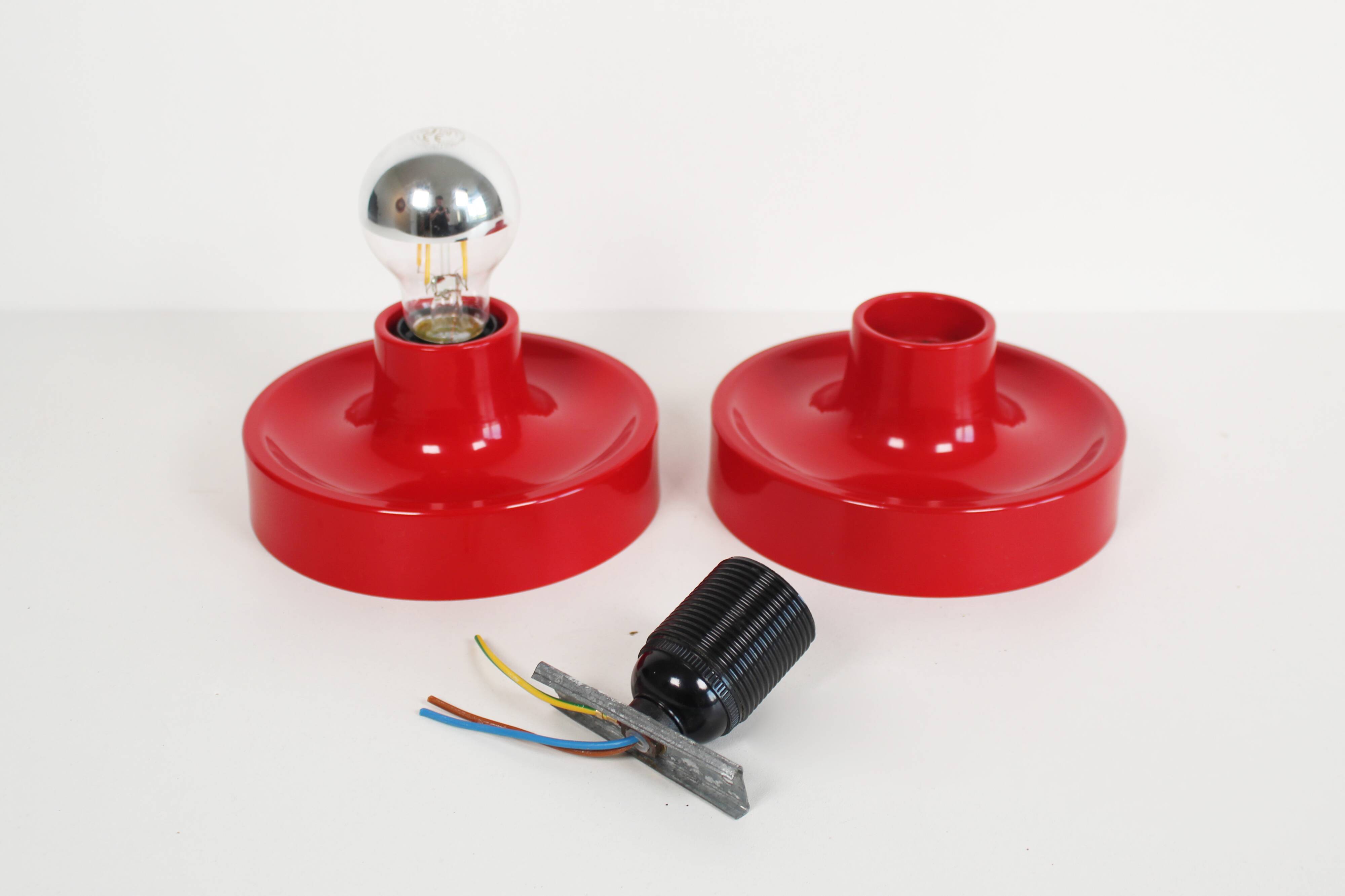 Pair of petite Disc sconces selected by Charlotte Perriand for Les Arcs