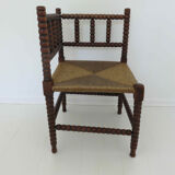 Corner chair in turned wood and straw