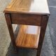 Beautiful vintage wooden bedside table with mirror.