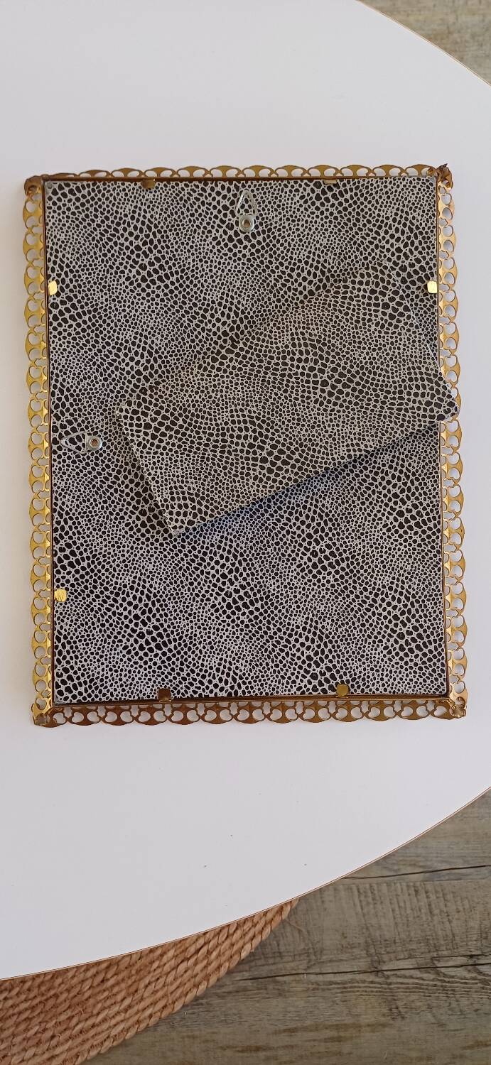 Golden metal frame from the 60s