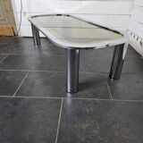 Designer coffee table in chromed metal with smoked glass top