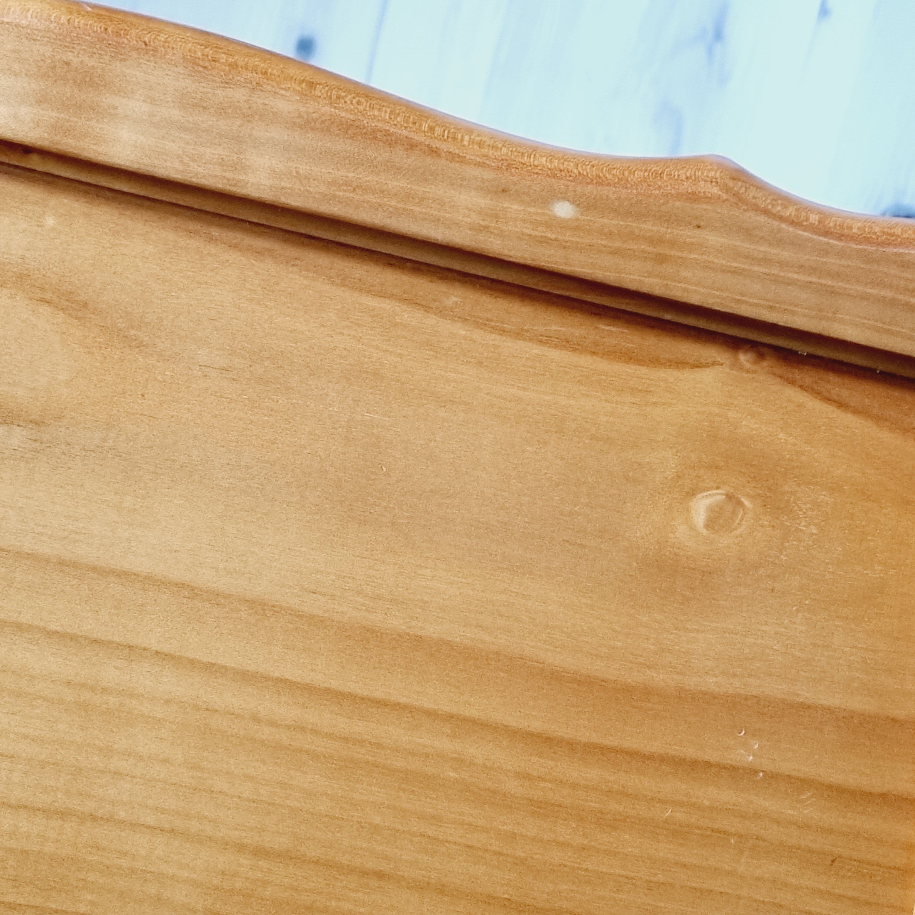 Side table with wooden and cane magazine holder