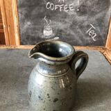 Handmade bluish enamelled sandstone pitcher speckled with brown