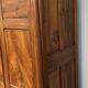 Empire wardrobe in solid walnut, France, mid-19th century.