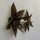 Pair of vintage patinated brass wall lights with floral motif, France, 1960.
