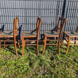Set of four wooden bistro chairs, green seat, mid-20th century.