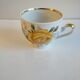 Porcelain cup and under cup