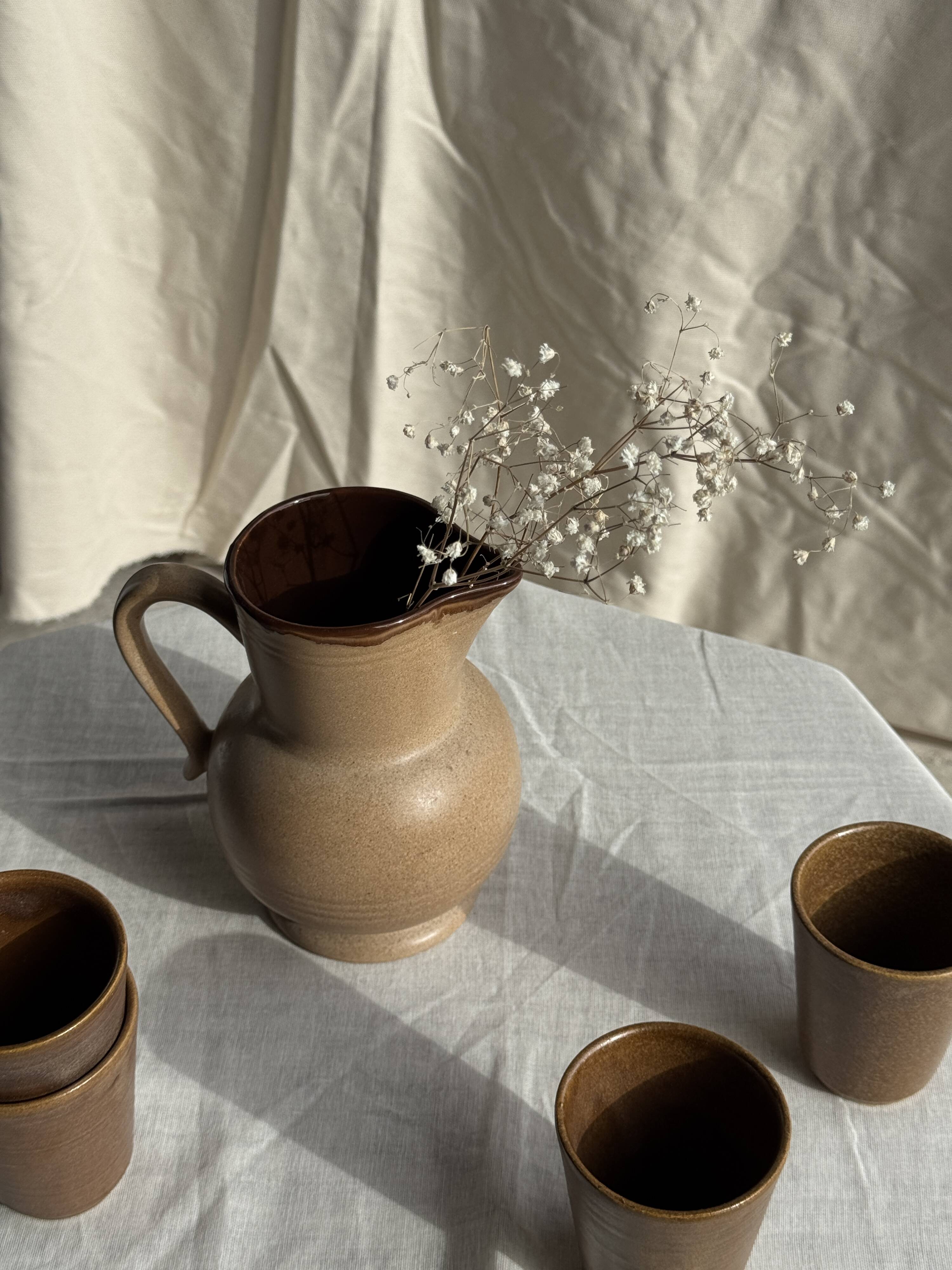 Set of 10 small stoneware mugs from Digoin.