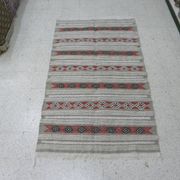 Geometric woven rug with fringes – Ethnic style – Hallway & interior