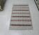 Geometric woven rug with fringes – Ethnic style – Hallway & interior