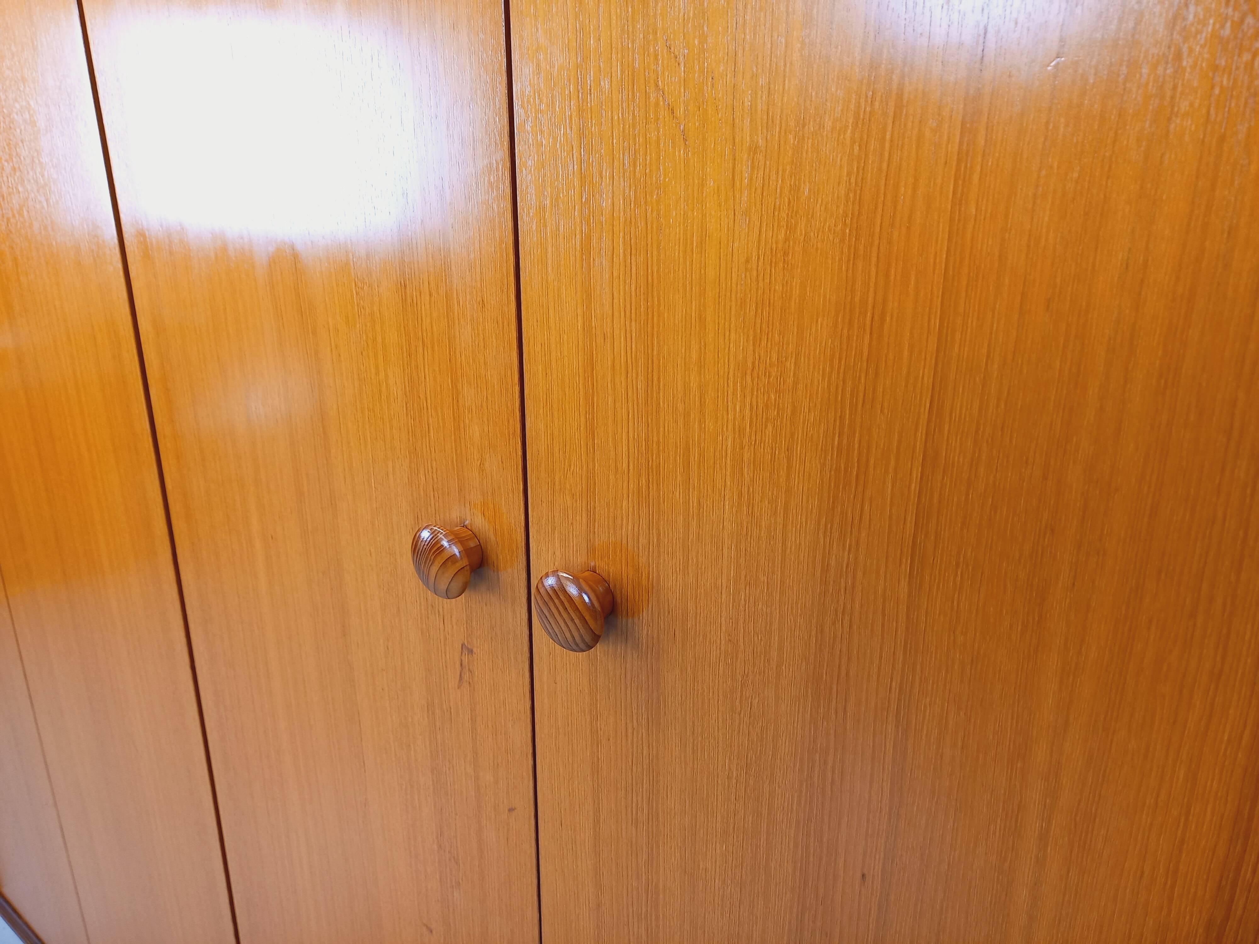 Vintage modernist teak and walnut wardrobe from the 60s and 70s