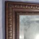 Grand miroir ancien biseauté cadre en bois sculpté