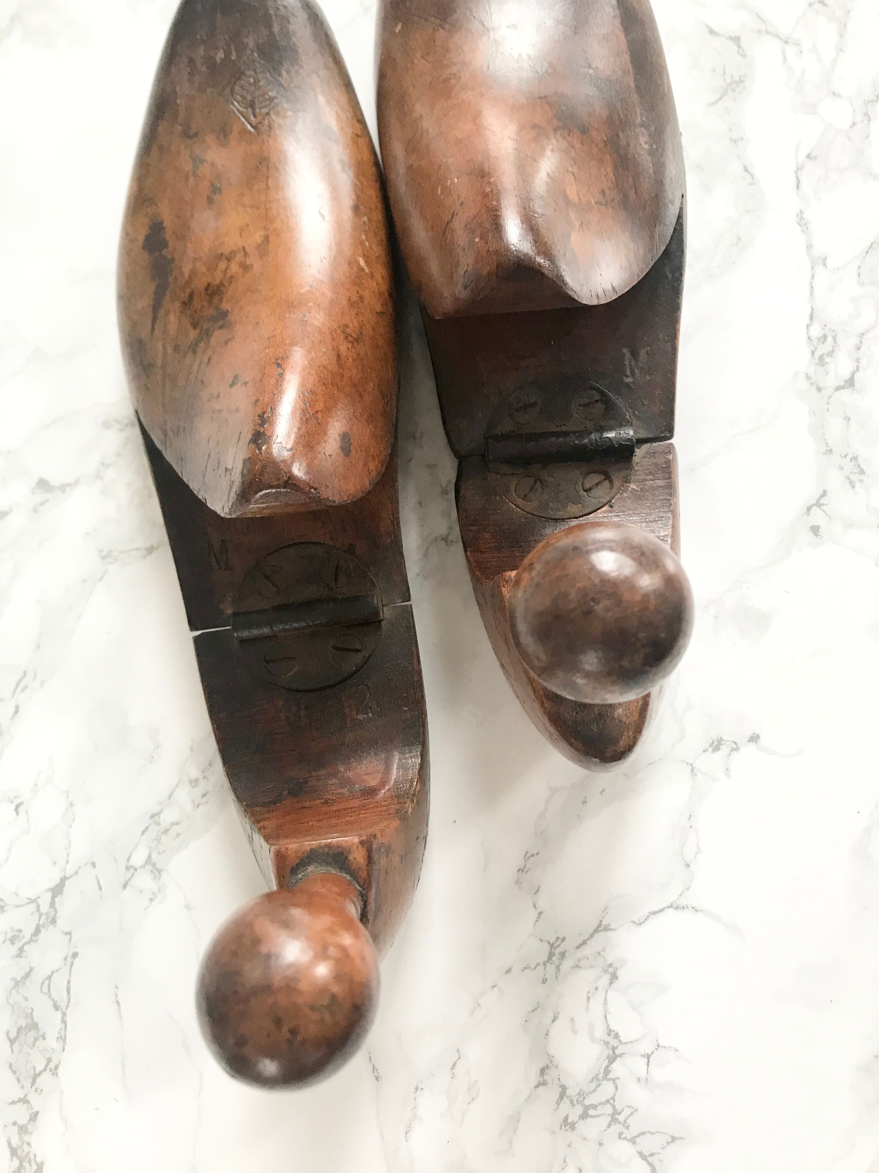 Pair of old solid wood shoes