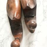 Pair of old solid wood shoes