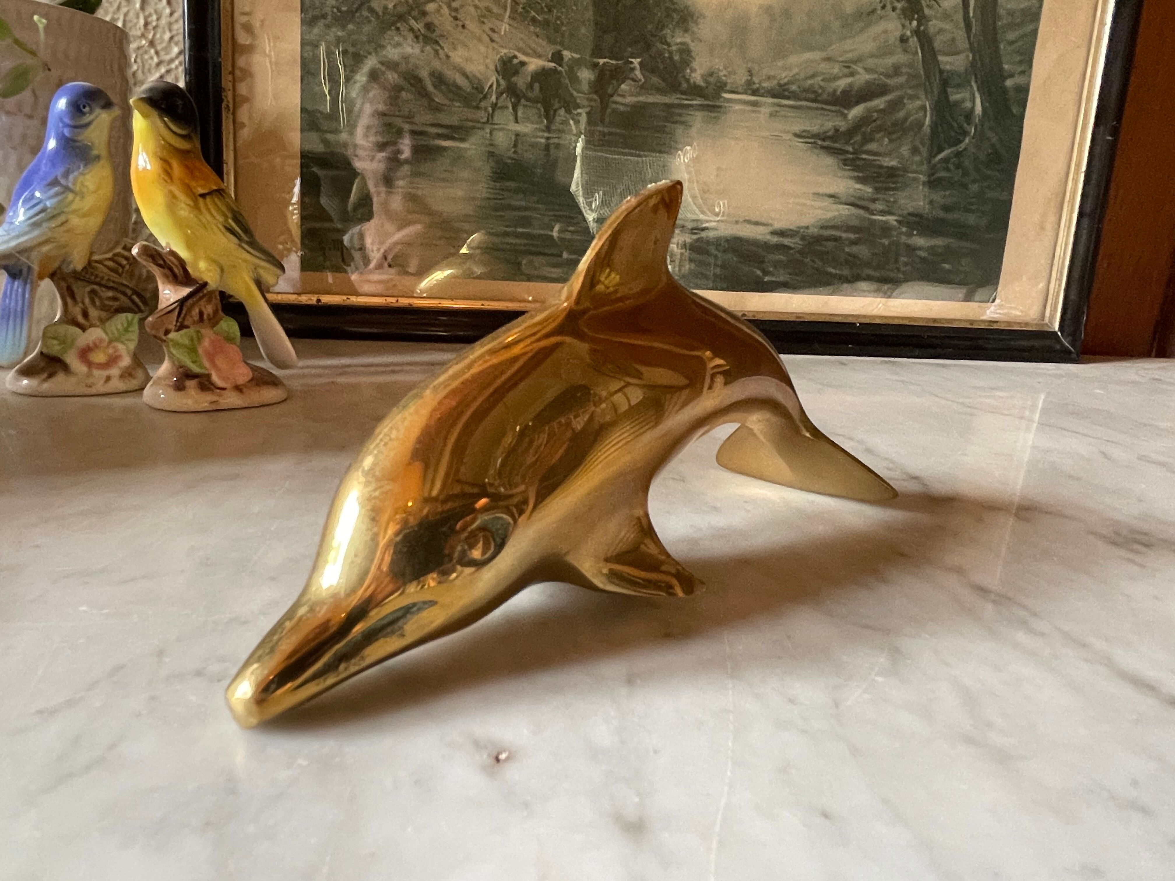 Vintage brass dolphin