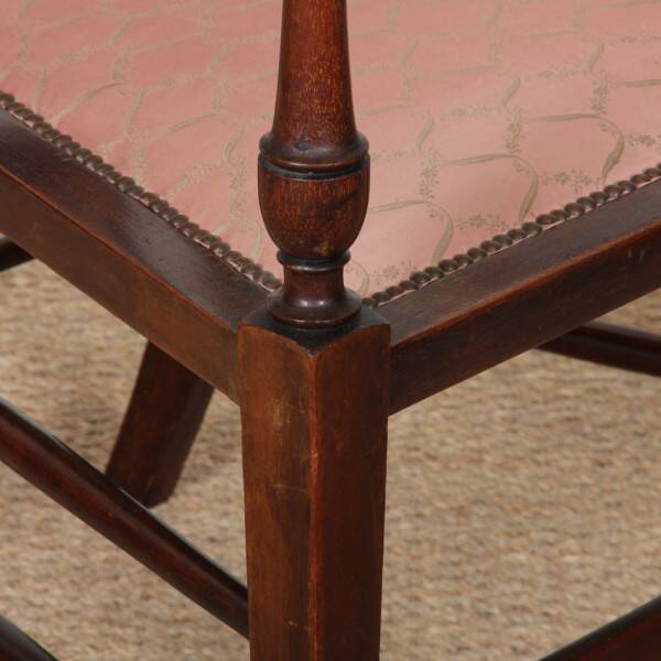 English armchair attributed to J.S. Henry, late 19th century.