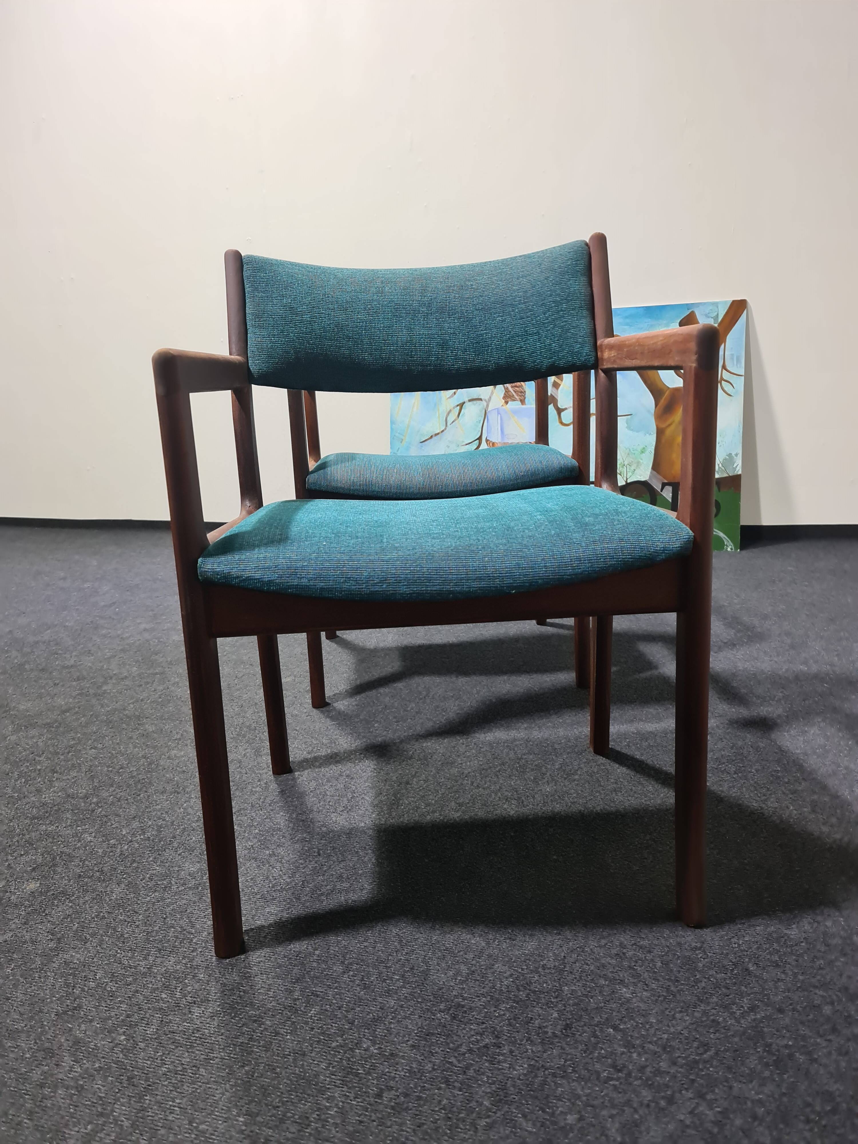 A pair of vintage teak Directors chairs