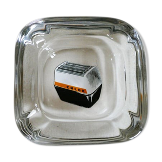 Vintage advertising ashtray in solid glass of the 1960s