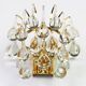 Large pair of gilt brass and crystal wall lights by Palwa, Germany, 1970s.