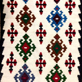 Small ethnic carpet