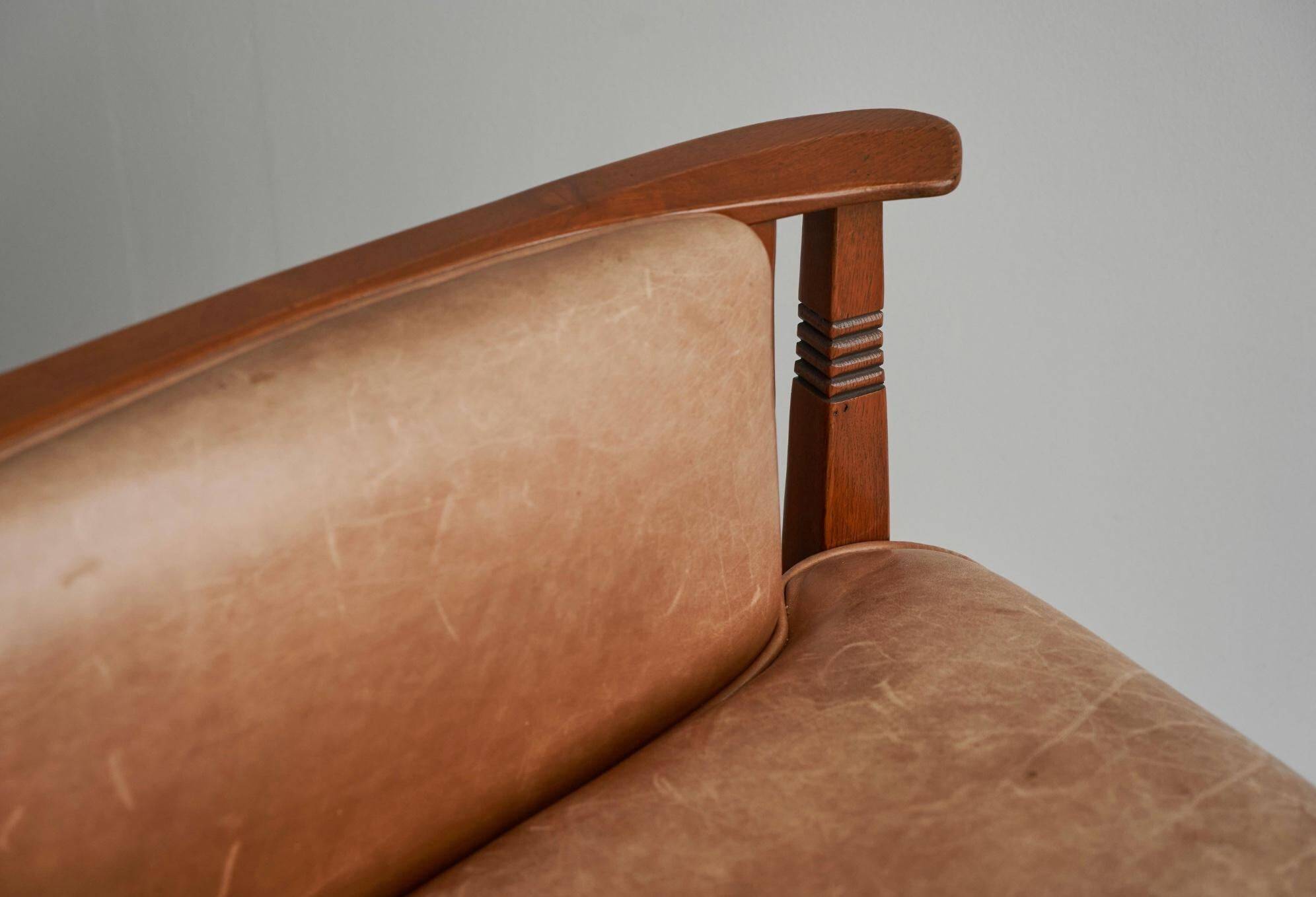 Art Deco armchair in solid oak and leather by Frits Schuitema