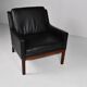 Leather and rosewood armchair by Kai lyngfeldt-Larsen. Denmark