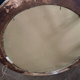 Patinated oval mirror