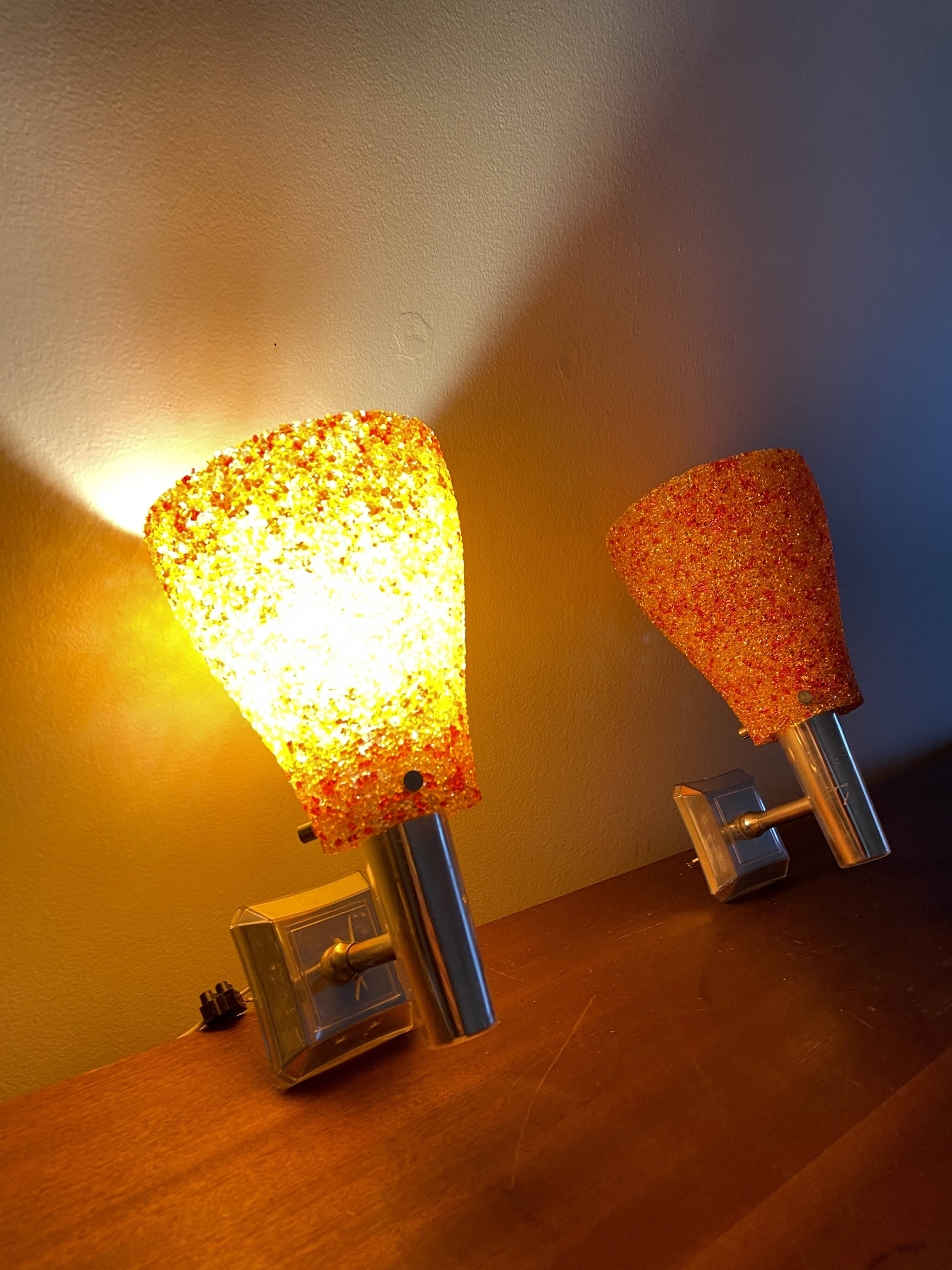 Pair of orange perspex wall lights from the 1950s.