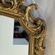 Large gilded mirror with acanthus leaf pediment H150 L98