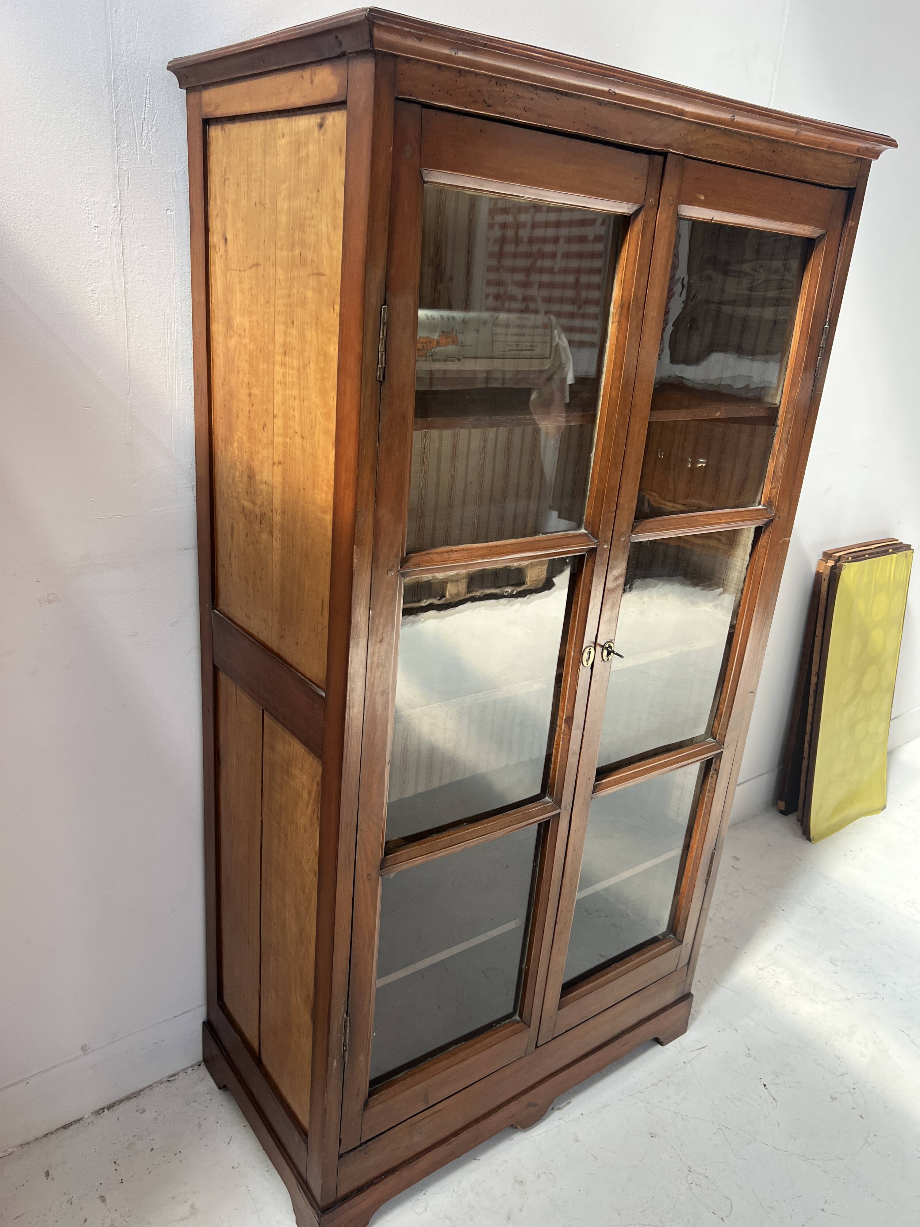 Pair of display cabinets in solid cherry wood from the 19th century.