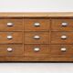 Antique workshop furniture with 9 solid wood drawers.