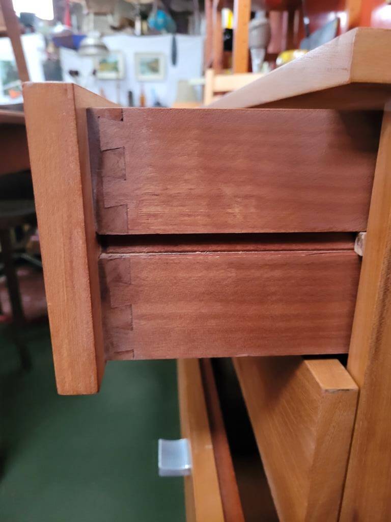 Solid wood chest of drawers with chrome legs from the 1970s.