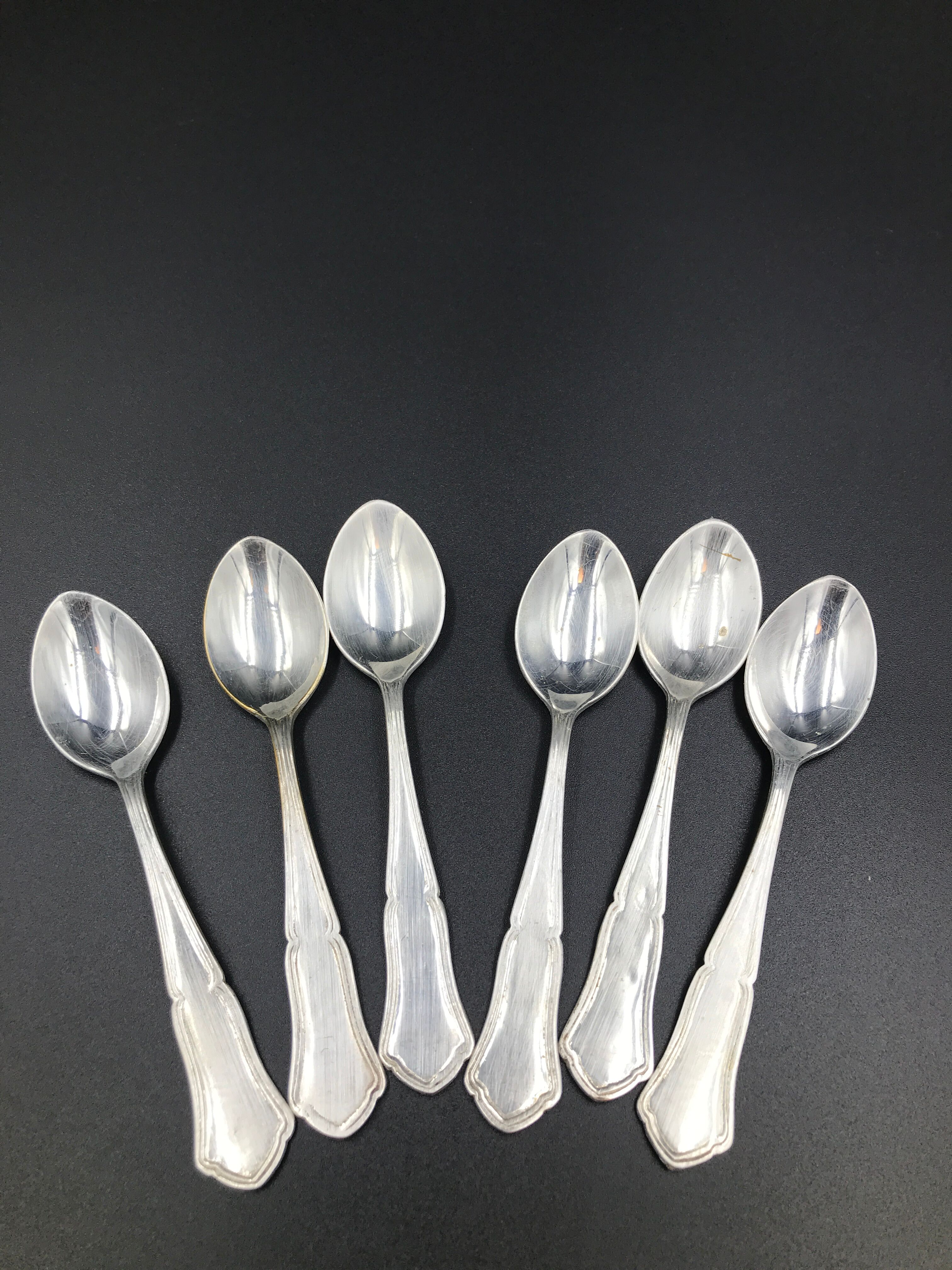 6 small metal silver spoons