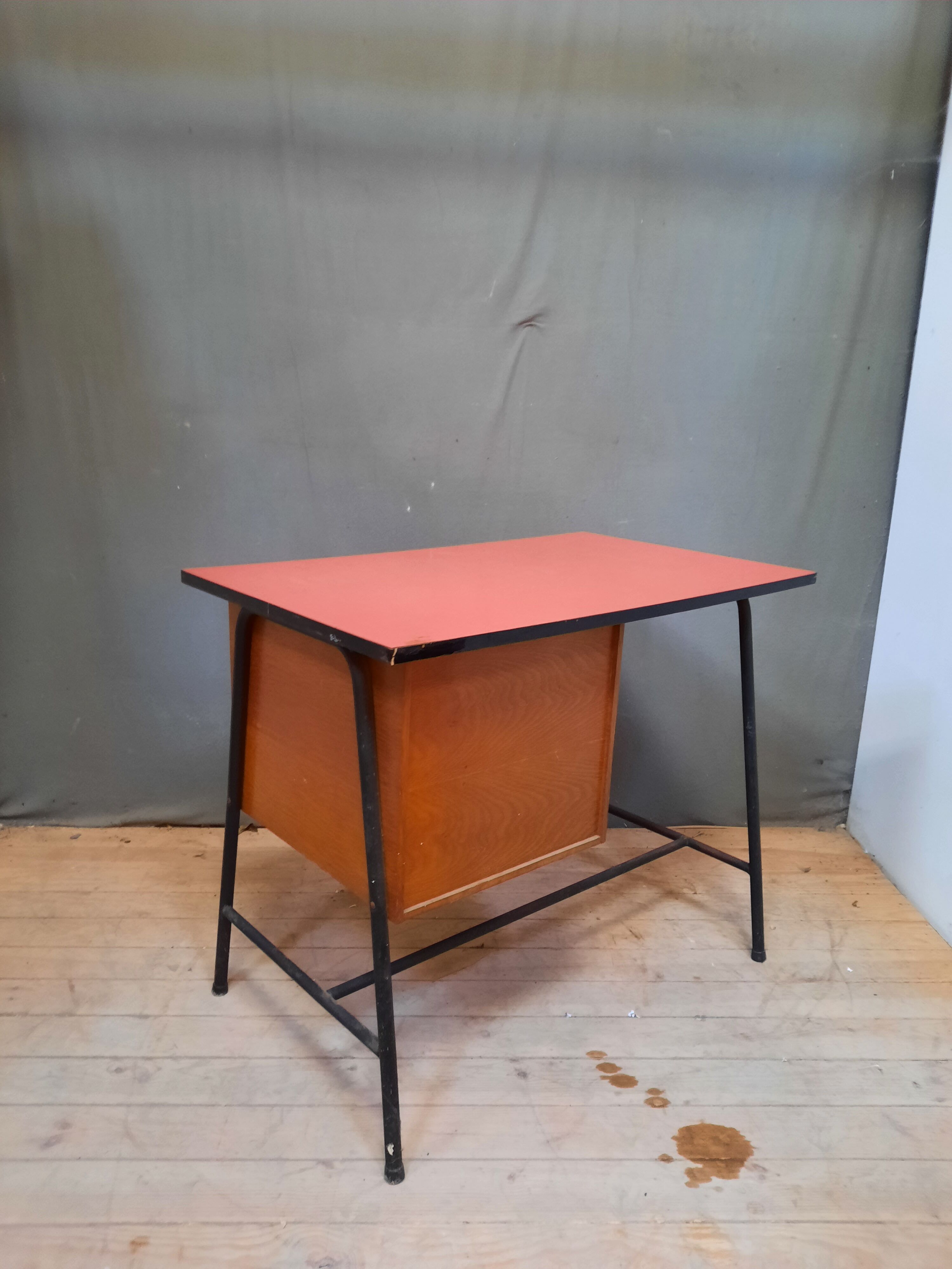 Red vintage desk and its chair