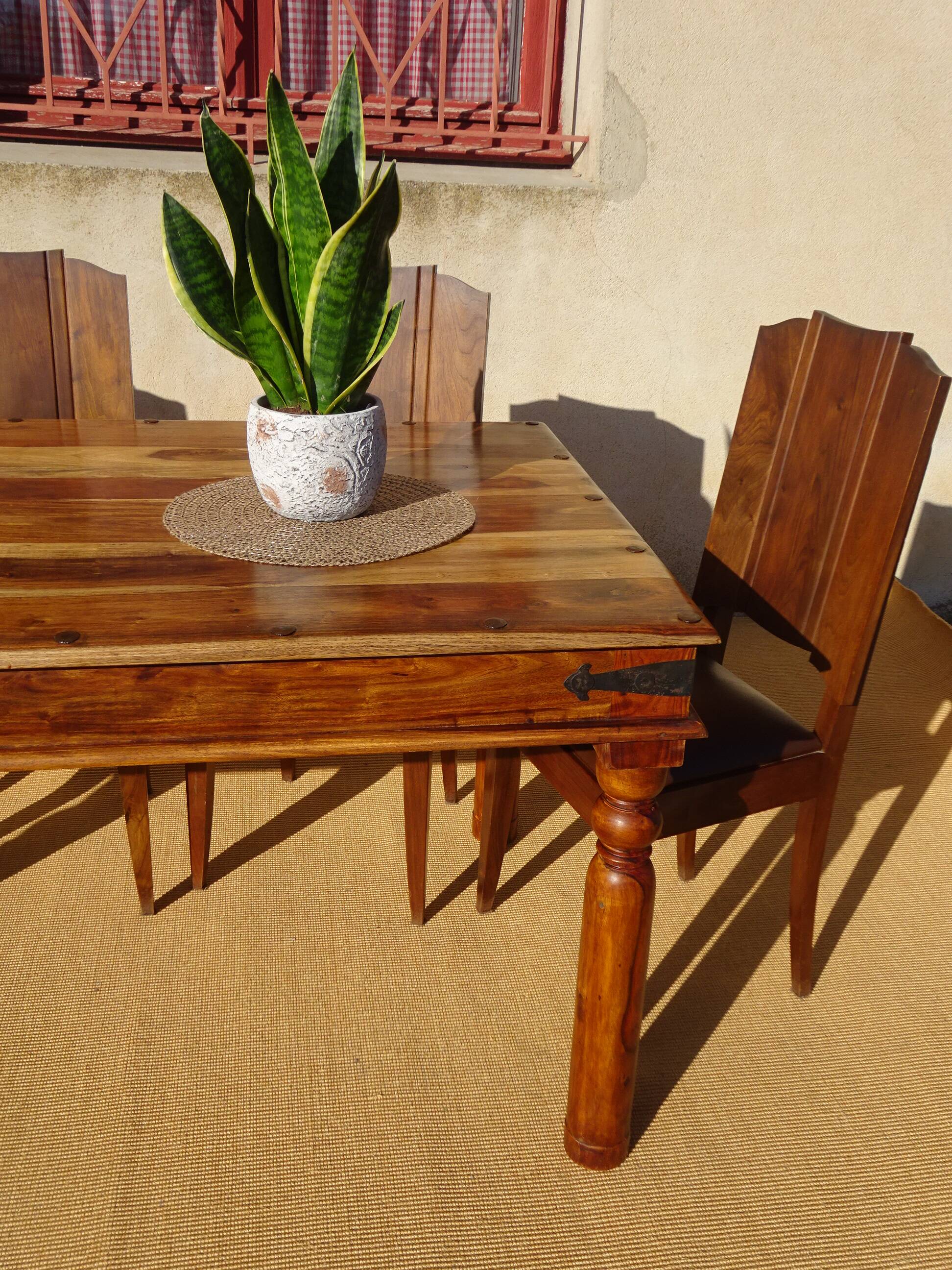 Solid wood and wrought iron table