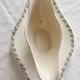 Antique sauce boat, ironstone, ivory with green floral and butterfly decoration.